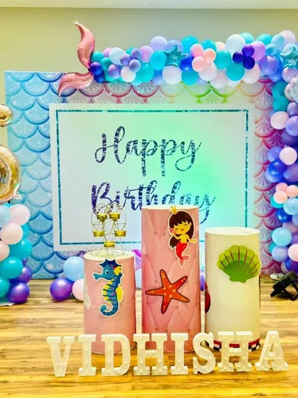 An under-the-sea adventure for Vidhisha's 5th birthday! The mermaid-themed decor, complete with shells, seahorses, and a beautiful balloon wave, made for a magical ocean party.