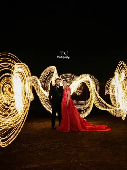 Let's get creative. For this shot, we used light painting to surround the couple in glowing swirls, creating a magical and energetic atmosphere. If you have a unique idea for your pre-wedding theme, I am always excited to bring it to life.