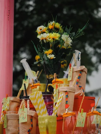 The little details matter. We use creative and personalized elements like these syringe shots and custom mugs to make your Haldi bar unique and memorable.