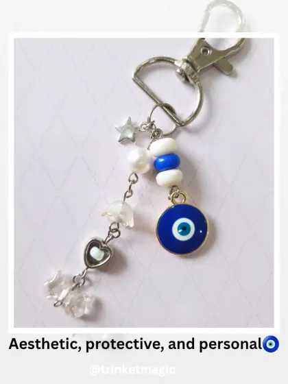 Aesthetic, protective, and personal. This custom evil eye keychain combines various good luck charms for a piece that's both beautiful and meaningful.