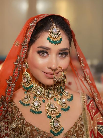 Her eyes do all the talking. This portrait captures the power and beauty of a classic Indian bridal look.