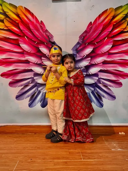 This Krishna and Radha pair captures the divine love and friendship that the festival represents.