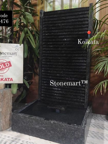 This 3-foot wall-mounted granite waterfall was sold to an office in Kolkata. Its compact size is perfect for reception areas or smaller rooms.
