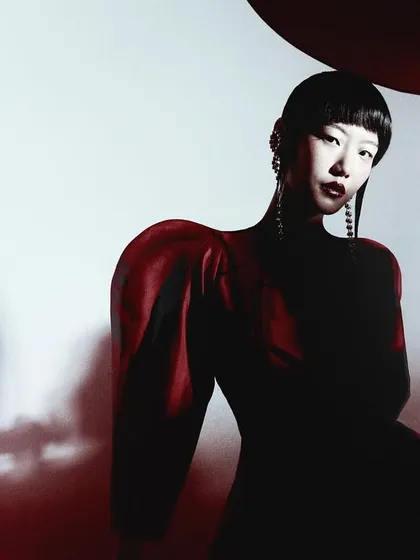 Another portrait from the Lovebirds campaign, this time playing with shadows on the model's face and the architectural shoulders of the dress.
