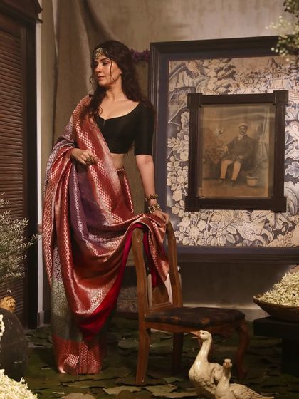 A profile shot capturing the model in a moment of reflection. This image demonstrates our skill in creating mood and narrative within a fashion shoot, going beyond simple product photography to tell a story.