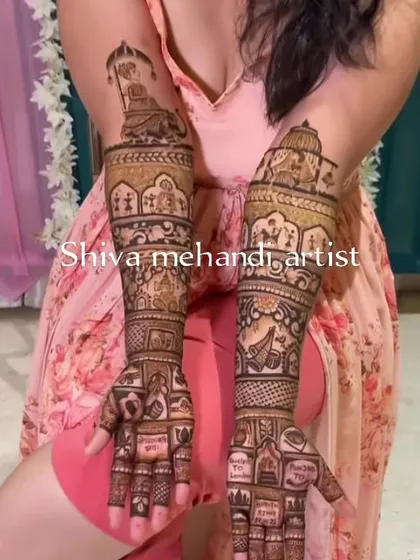 This design tells a story with multiple scenes, including a doli ceremony and portraits of the couple. It's a comprehensive narrative of the wedding day on the bride's arms.