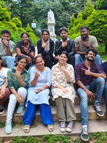 Our volunteers take a break for a group photo in Lalbagh. Our activities take us all over Bangalore, from parks to schools to community centers.