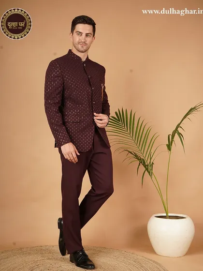 A dapper look in a deep maroon Jodhpuri suit, perfect for a wedding reception or formal event.