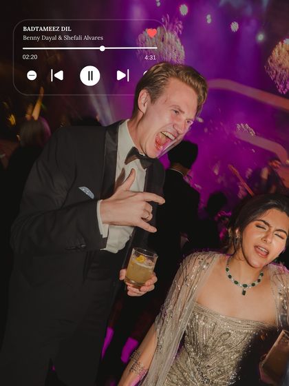 Pure, unadulterated fun. This candid shot of guests singing and dancing their hearts out is what makes a wedding celebration unforgettable.