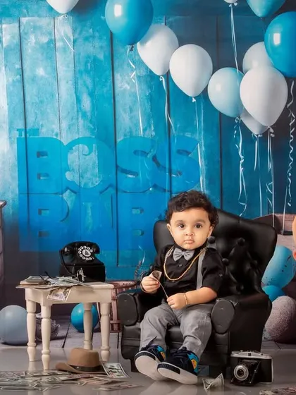 A full view of the Boss Baby setup, with the little boss sitting confidently in his chair, surrounded by props.
