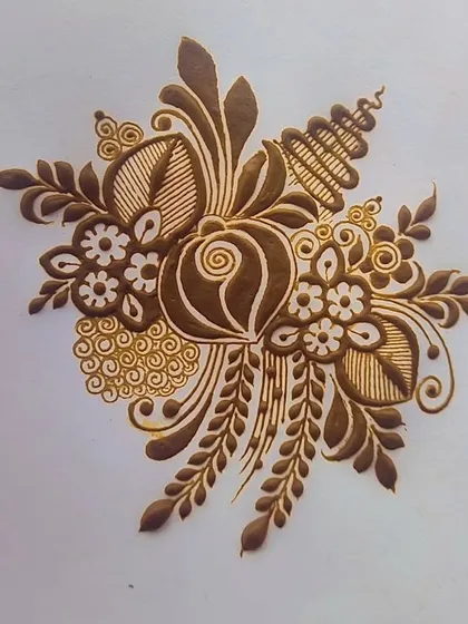 This is a demonstration of a floral bunch, a versatile element in many mehendi designs. We practice combining different flowers, leaves, and vines.