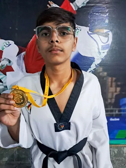 Anshul Tanwar celebrating his CBSE Gold medal win, which qualified him for the CBSE Nationals.