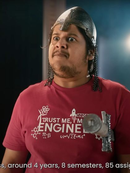 This character's "Trust me, I'm an engineer" t-shirt was a specific choice to build his quirky persona within the Casio ad's storyline. It’s a great example of how a single wardrobe piece can add a layer of personality and humor.