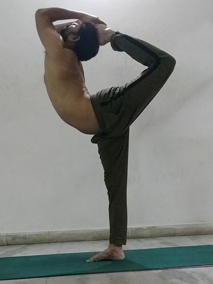 The classic Natarajasana, or Lord of the Dance Pose. This balancing pose strengthens the legs, improves mental balance, and is therapeutic for knee issues when done with proper alignment.