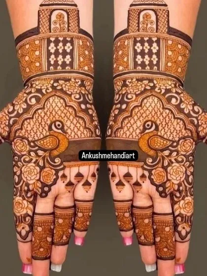 A lovely design with symmetrical peacocks surrounded by rose patterns, perfect for a guest or for a simpler bridal look.