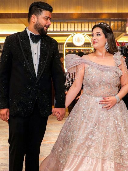 A classic portrait of the engaged couple. The bride's subtle makeup look allows her natural beauty and happiness to shine.