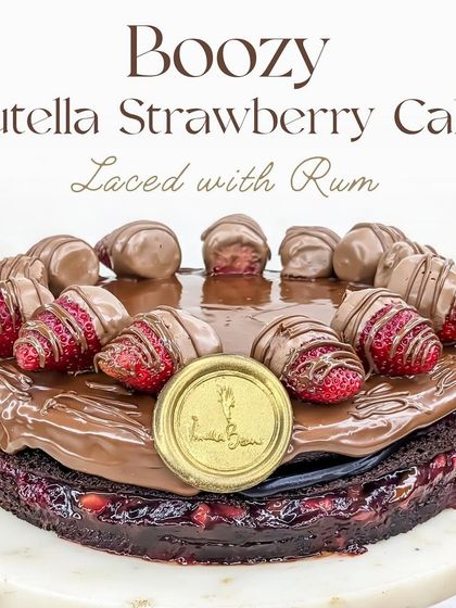 Our Boozy Nutella Strawberry Cake, laced with rum. It's the perfect grown-up version of our signature bestseller, ideal for special occasions.