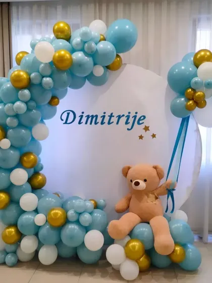 A cute teddy bear theme with a blue and gold balloon crescent moon, perfect for a baby boy's birthday.