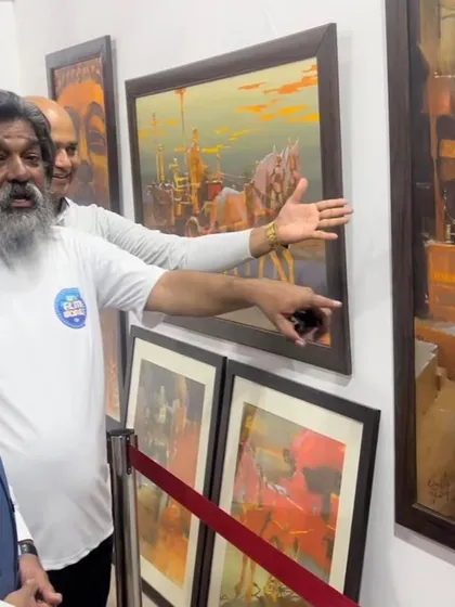 Shri Nitin Desai discussing my artwork, which was displayed at his grand art exhibition in Karjat. A treasured memory.