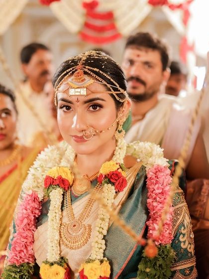 A candid shot of the bride during her ceremony. My makeup is designed to look beautiful and hold up, even in the midst of a crowded and emotional event.