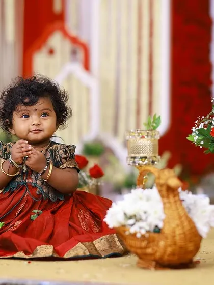 This is why I do what I do. Seeing the little one, the star of the show, looking so precious amidst the decor we've lovingly crafted, is the most rewarding part of my job. These are the moments I help you cherish forever.