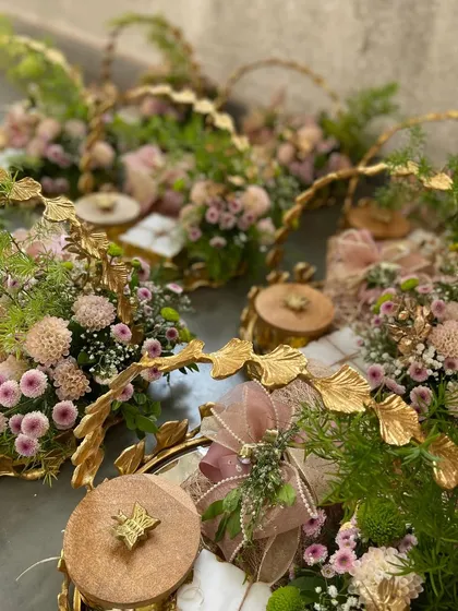 We specialize in creating breathtaking arrangements of gifts, like these bespoke hampers featuring delicate florals and a soft, romantic color palette. Each one is a testament to our commitment to beauty and personalized detail, perfect for weddings, anniversaries, or any heartfelt gesture.