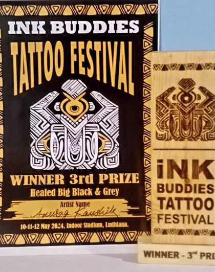A closer look at our 3rd prize trophy and certificate from the Ink Buddies Tattoo Festival. We are grateful for the recognition of our hard work and dedication.