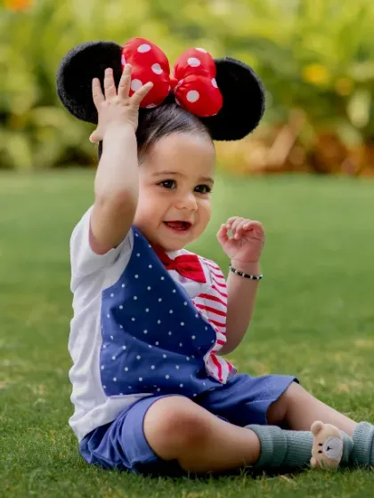 These are the moments we live for. A touch of Disney magic with Mickey ears in the park.