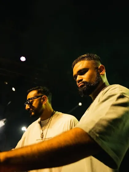 A close-up shot of me and Nikhil Chinapa during the Innellea afterparty, showing our focus and chemistry.