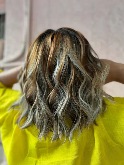 Extra sass with this blonde burst. I added a mix of platinum and warm blonde highlights to this bob for a multi-tonal, high-contrast look.