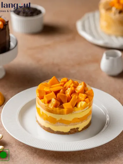Summer vibes in every bite. Our Mango Cheesecake Bento is incredibly creamy and refreshing, infused with Alphonso mango chunks and topped with even more fresh mango.