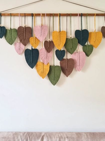 Elegant and earthy, this boho macrame leaf hanging adds a touch of nature-inspired charm. Handcrafted with love, each leaf brings a pop of color and a bohemian vibe to your decor.