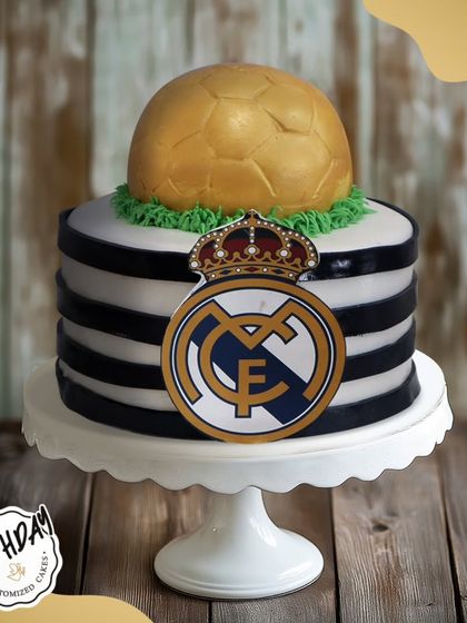A champion's cake for Arjun's birthday in Dwarka. This Real Madrid cake, complete with the team crest and a golden football, is a fitting tribute for a true fan of the club.