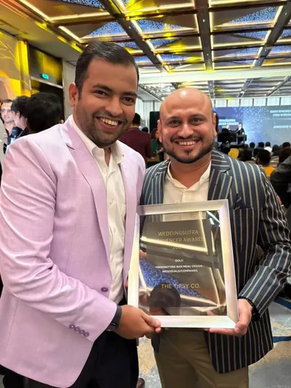 Our founders proudly posing with the Gold award at the 2024 WeddingSutra ceremony. Each award fuels our passion to continue pushing the boundaries of event bartending.