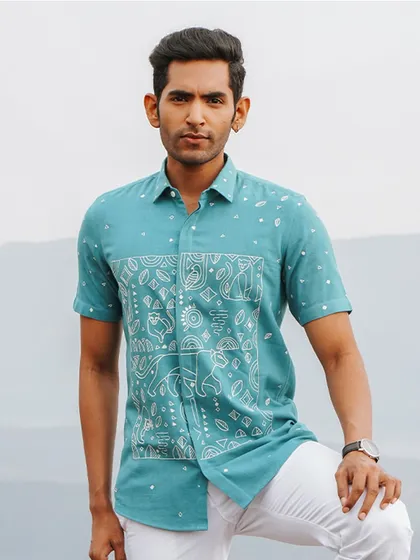 Another look at the hand-embroidered panther motifs. This shirt is designed for those who lead with quiet dominance and refined style.
