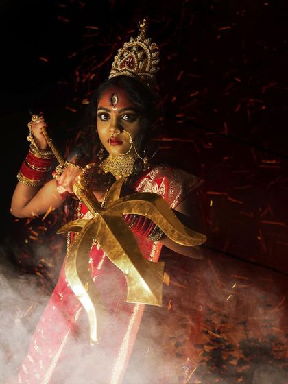 A powerful depiction of Goddess Durga, created for Navratri. This look showcases dramatic makeup and styling.