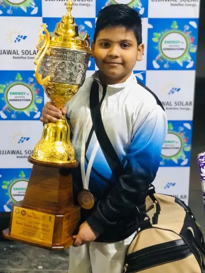 Young Yuvan with the team trophy. He is one of our youngest and most promising champions.