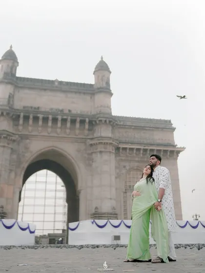 A grand portrait in front of the Gateway of India in Mumbai. This is a perfect shot for a destination pre-wedding photoshoot.