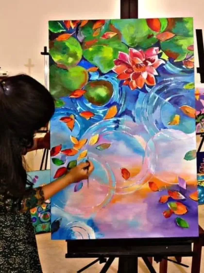 It is never too late to pick up a brush. Here, an adult student is completely absorbed in creating a large, vibrant canvas, showing that my classes are a perfect escape to explore your artistic side at any age.