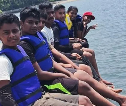 Young participants of our Wind Surfing and Sailing Course at Karwar take a break on the dock, ready for their next session.