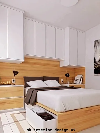 This design showcases smart storage solutions for a compact bedroom. It includes overhead cabinets and a bed with a large pull-out storage drawer.