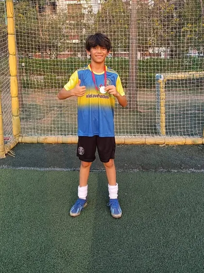 Thumbs up from a Player of the Month. We recognize effort and a positive mindset.