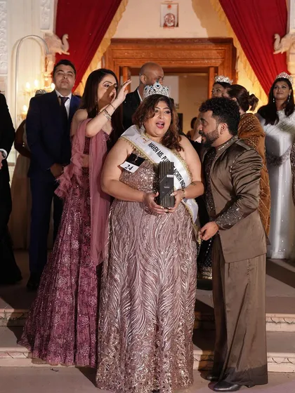 A candid moment during the crowning ceremony. The joy and excitement are palpable.