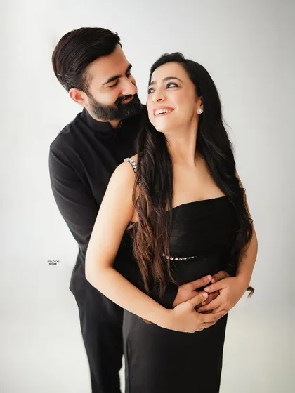It's all in the way you look at each other. For my couples' studio sessions, I focus on capturing your real connection without any cheesy poses. This simple, happy portrait in my light and airy setup is all about their natural chemistry.
