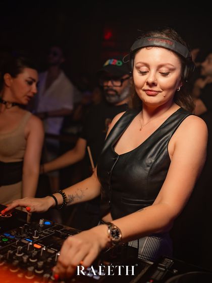 A close-up of me mixing at Raeeth. You can see the focus and precision that goes into every set.