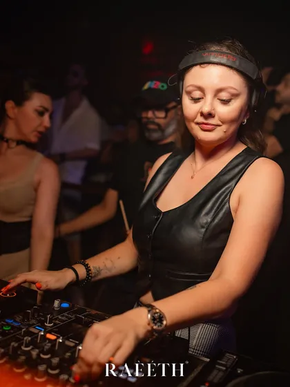 A close-up of me mixing at Raeeth. You can see the focus and precision that goes into every set.