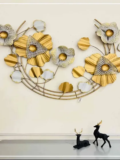 This vintage-inspired metal wall decoration resembles a basket filled with beautiful golden and silver flowers. Meticulously crafted by our talented artisans, it adds a lovely, rustic charm when hung on the wall.