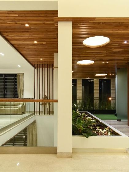 These images highlight our use of wood to bring warmth and texture to modern interiors, from wooden ceilings and partitions to beautiful hardwood floors.