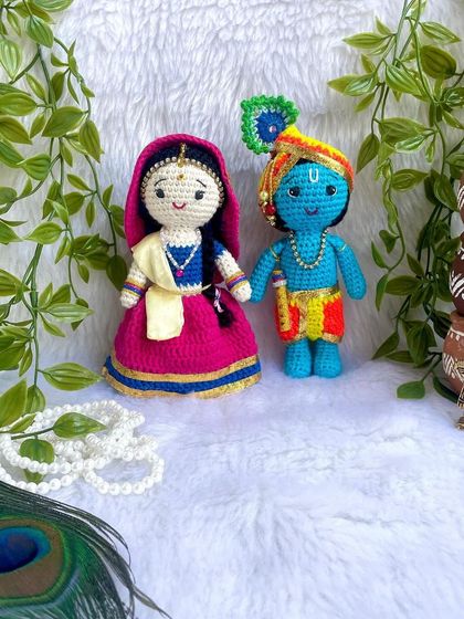 The divine couple, Radha and Krishna. I made this beautiful pair to celebrate the festival of Holi. Radha's lehenga and Krishna's turban are crafted with bright, festive colors.