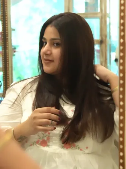 The final reveal. After a Protein Shake Hair Spa, you'll see hair that is visibly smoother, stronger, and full of healthy shine. It's the perfect way to bring tired hair back to life.